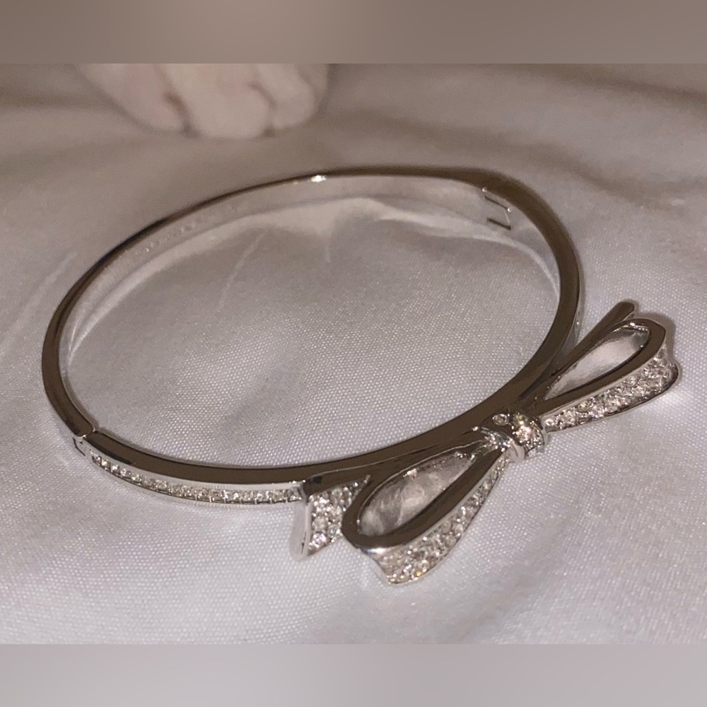 Kate Spade Elegant Silver Rhinestone Tie Bow Bangle Bracelet w/ hinged clasp